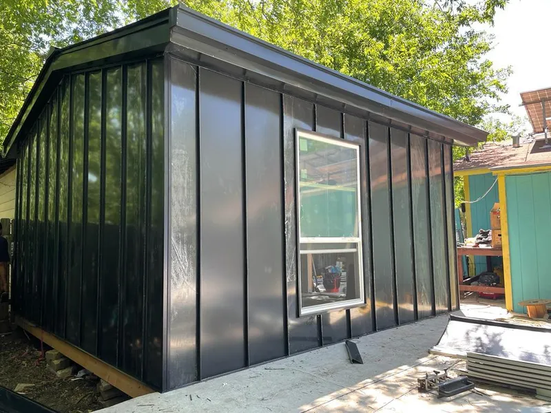 Black standing seam metal wall panels for Roof Inspection in Wendell