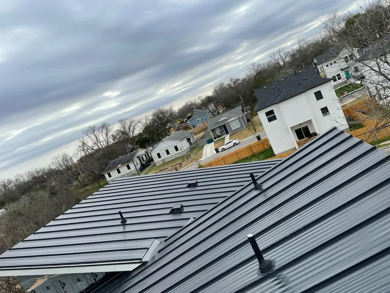Standing seam metal roof panels with vents for Skylight Repair in Wendell
